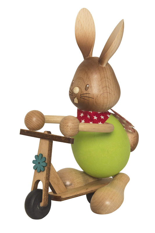 Drechslerei Kuhnert - Decorazioni pasquali / Coniglio pasquale - Coniglio Stupsi su scooter - Legno - Made in Germany